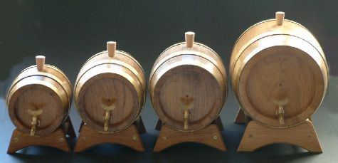 small wooden barrel taps with brass rings